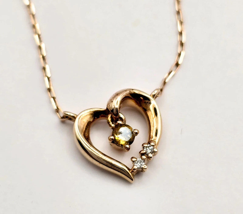 4℃ - 10ct. Rose Gold Heart Necklace with Diamonds